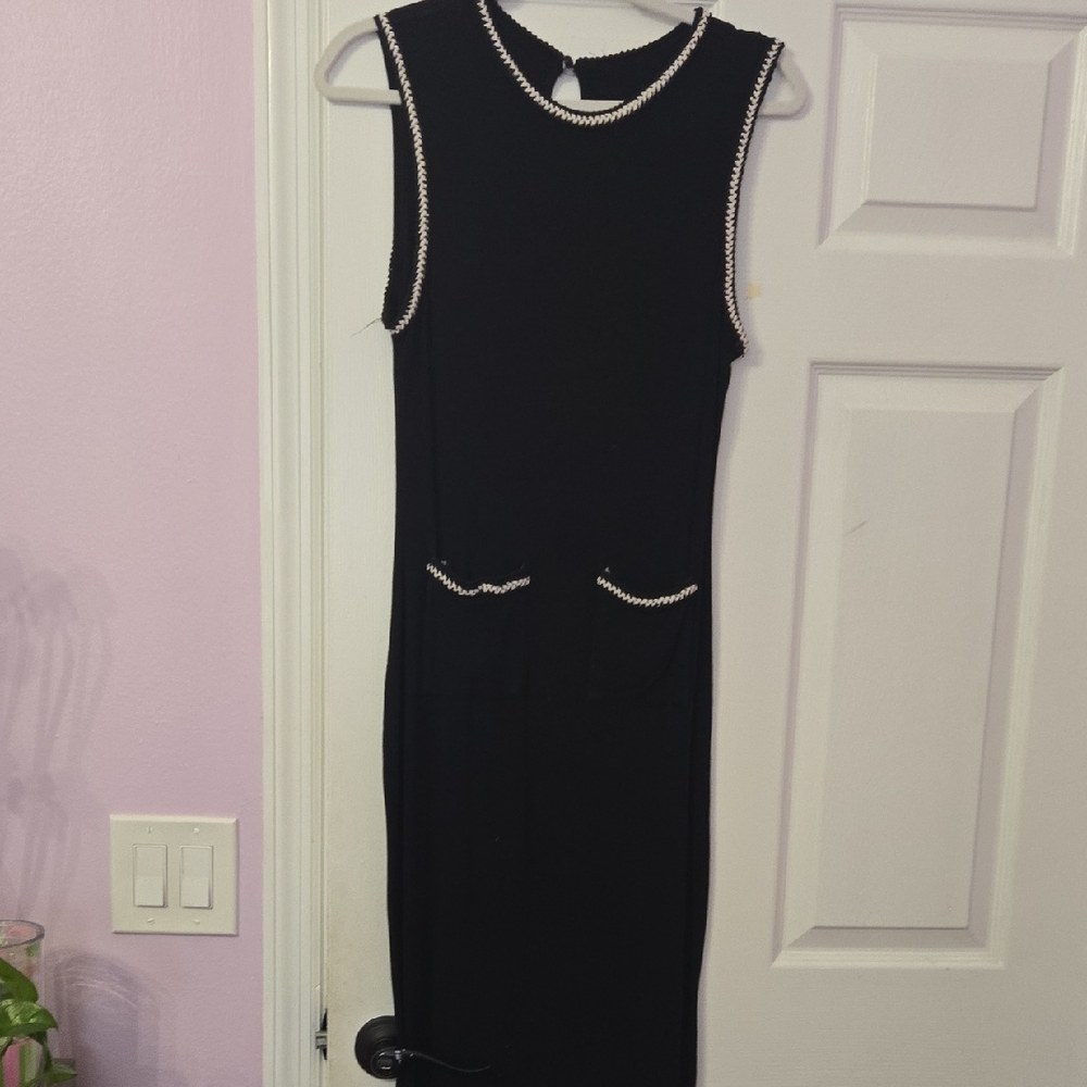 Elegant Black Sleeveless Dress with White Trim